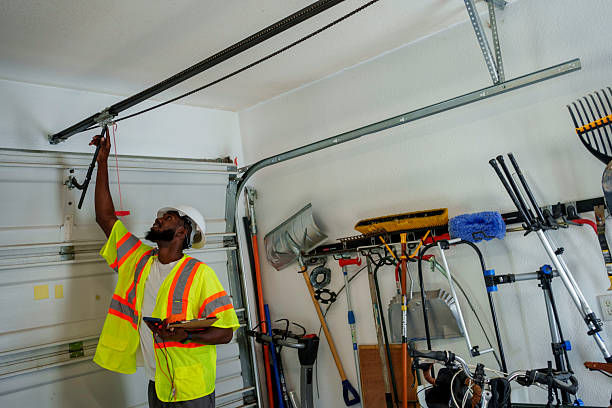 Professional Garage Door Panel Replacement technician working in Clinton, IN